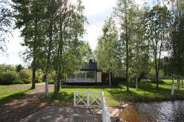 Фото номера Коттедж с видом на озеро Дома для отпуска Cottage Baydar г. Jyräänkoski 68